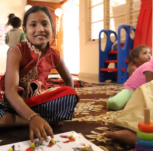 Kinderen in een kinderopvang in Bangalore.